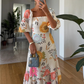 Tailliertes Kleid mit Karree-Ausschnitt, Blumenmuster und Puffärmeln