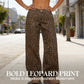 Damen-Jeans mit Leopardenmuster mit hoher Taille und weit been.