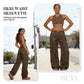 Damen-Jeans mit Leopardenmuster mit hoher Taille und weit been.