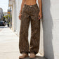 Damen-Jeans mit Leopardenmuster mit hoher Taille und weit been.
