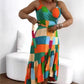 Damen Kleid mit farbenfrohem geometrischem Muster, Taillengürtel und Volantsaum