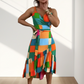 Damen Kleid mit farbenfrohem geometrischem Muster, Taillengürtel und Volantsaum