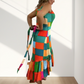 Damen Kleid mit farbenfrohem geometrischem Muster, Taillengürtel und Volantsaum